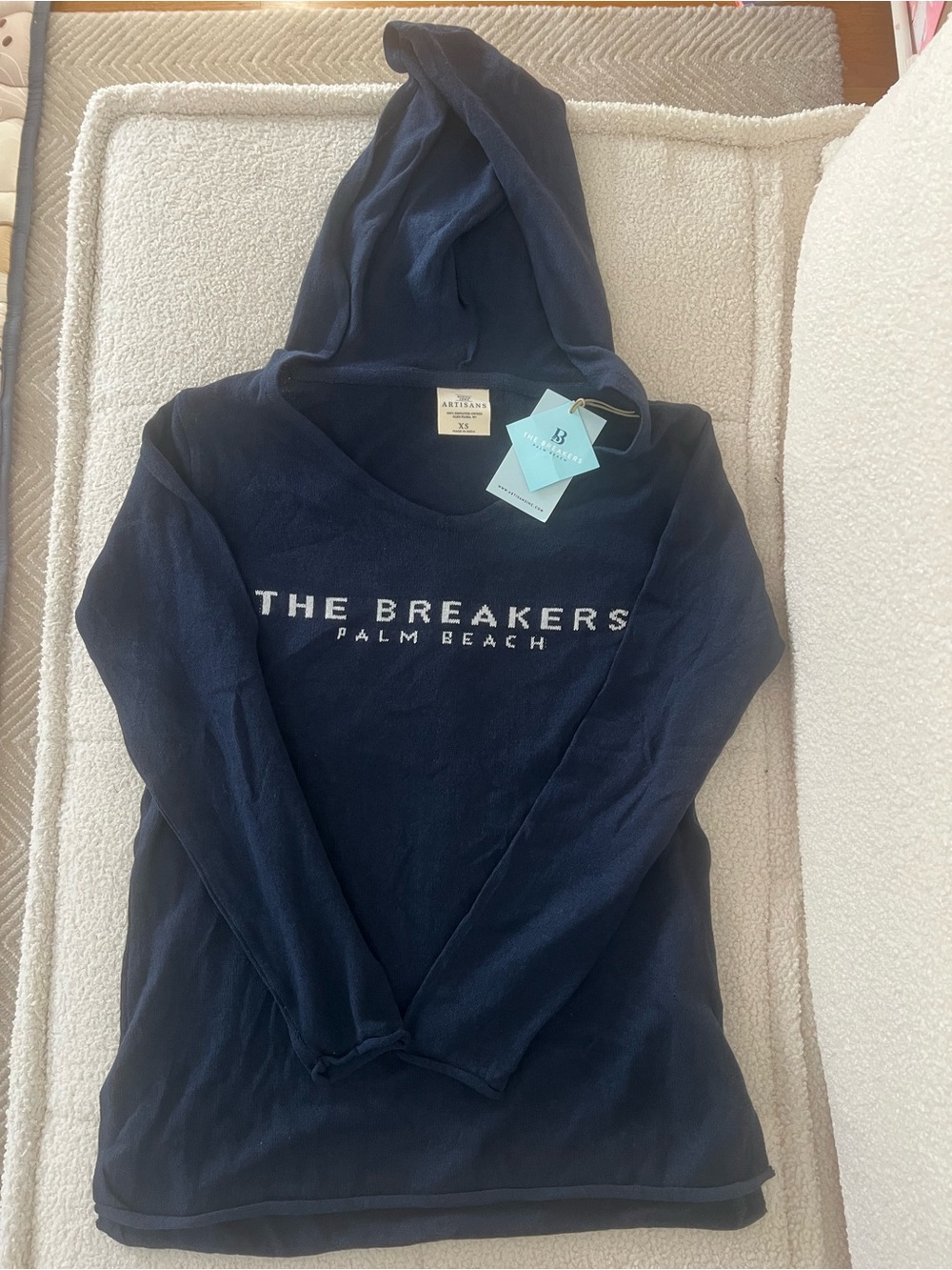 The Breakers HotelNavy hooded crewneck with white 'THE BREAKERS PALM BEACH' logo
